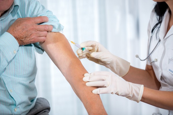 Image of a patient being vaccinated